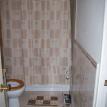 Full bathroom with tub and adequate space